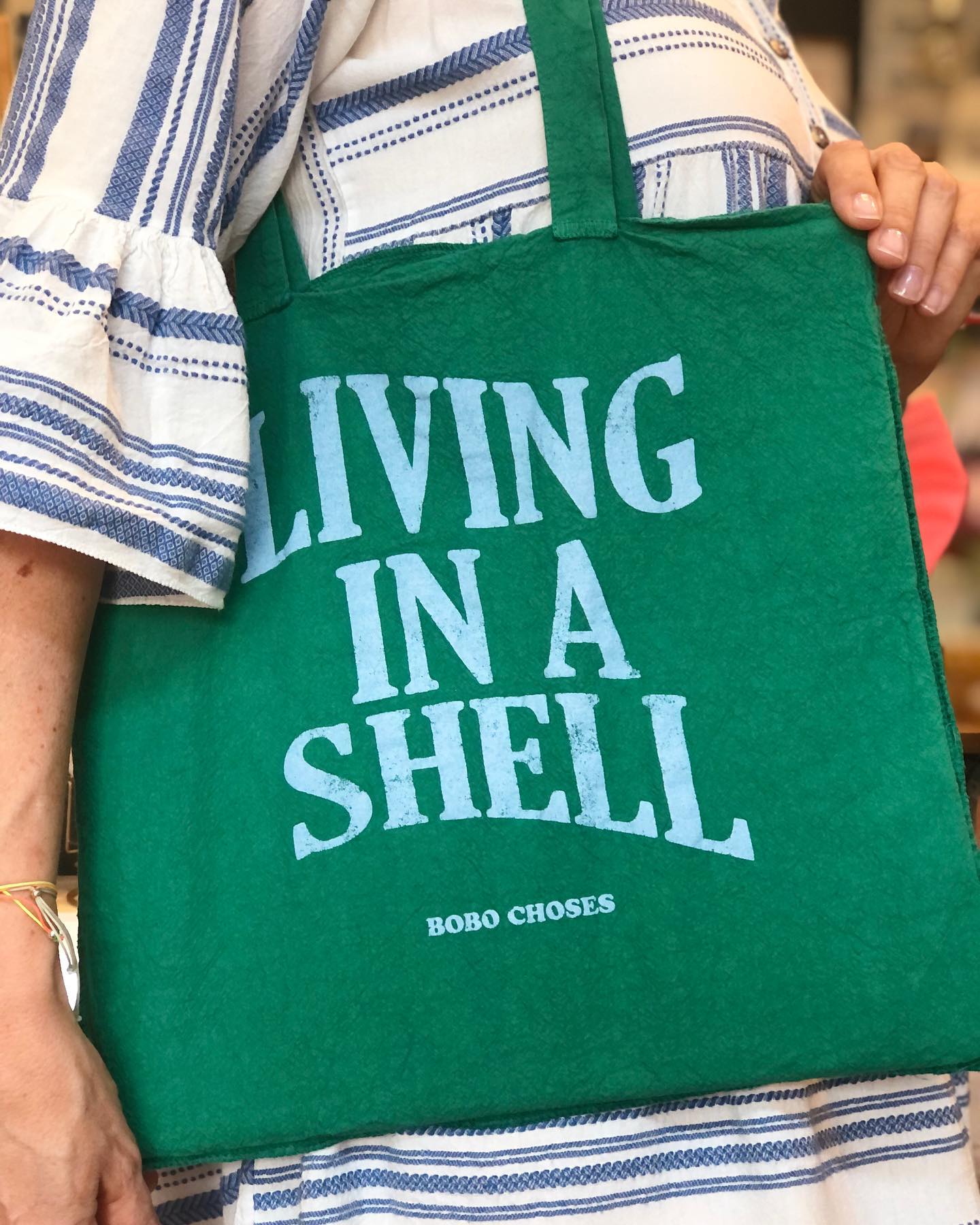 LIVING IN A SHELL GREEN TOTE BAG